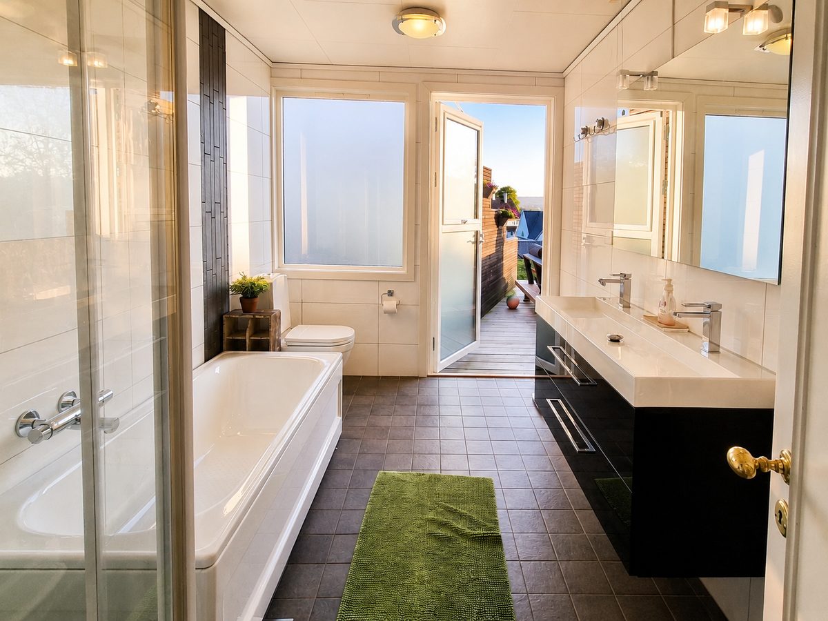 Bathroom with bathtub, shower and double vanity