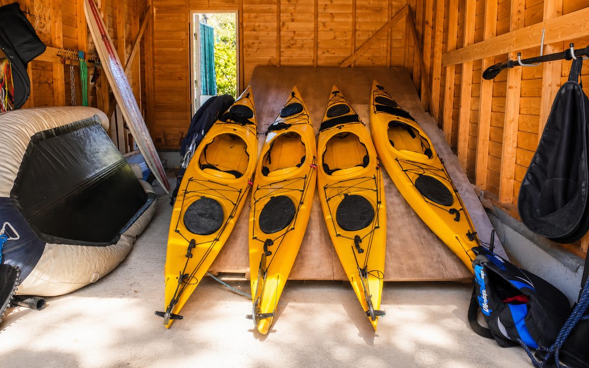 Kayaks ready in the boathouse